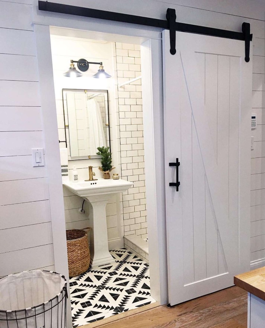 Barn door covering a bathroom
