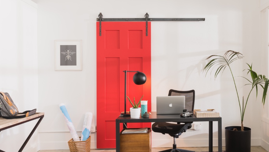Red barn door in home office