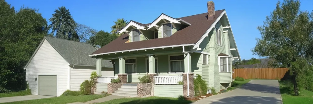 Mint green craftsman style home