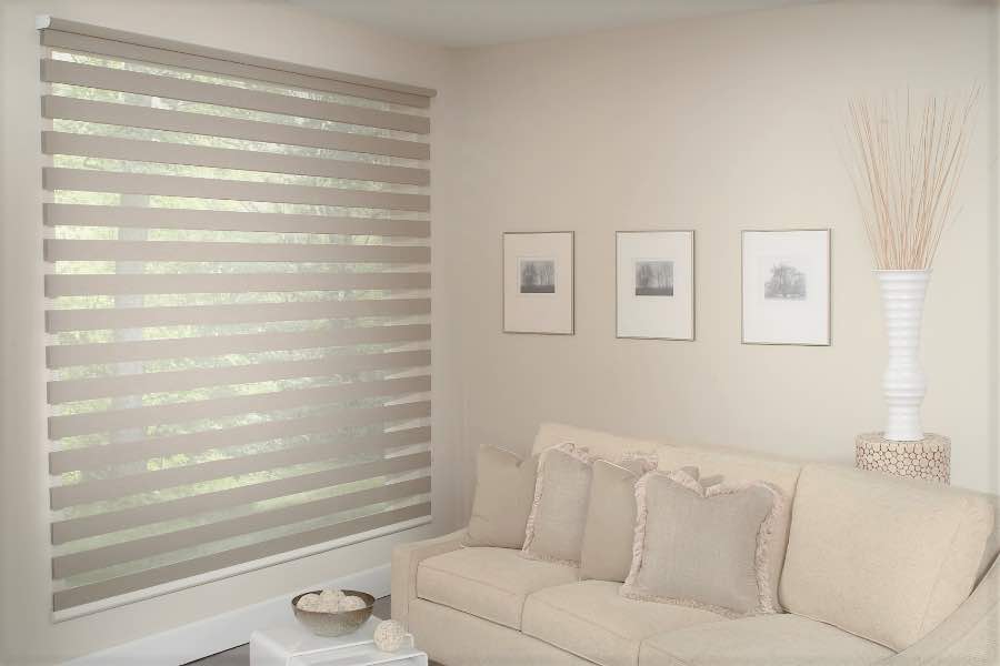 Zebra shades give you a unique combination of light control and style that benefits your Riverside home. Zebra shade allows filtered light into a living room