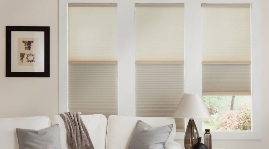 Cellular shades are energy efficient and stop air from entering through your window. Cellular shades in a Riverside living room