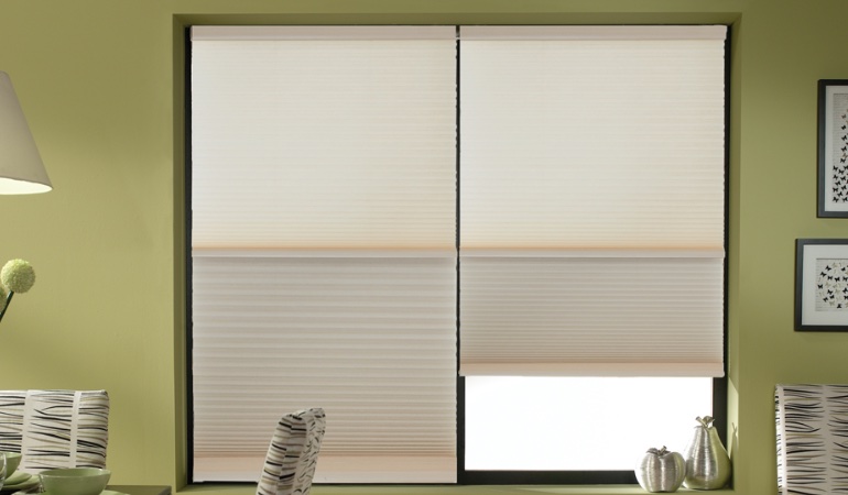 Cellular shades are offered in a variety of colors and designs. Cellular shades by in a Riverside dining room.