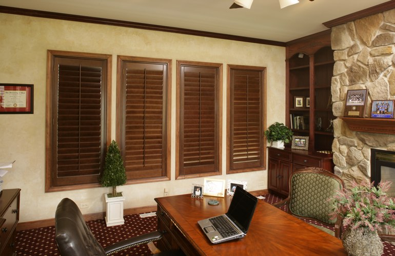 Wooden plantation shutters in a Riverside home office