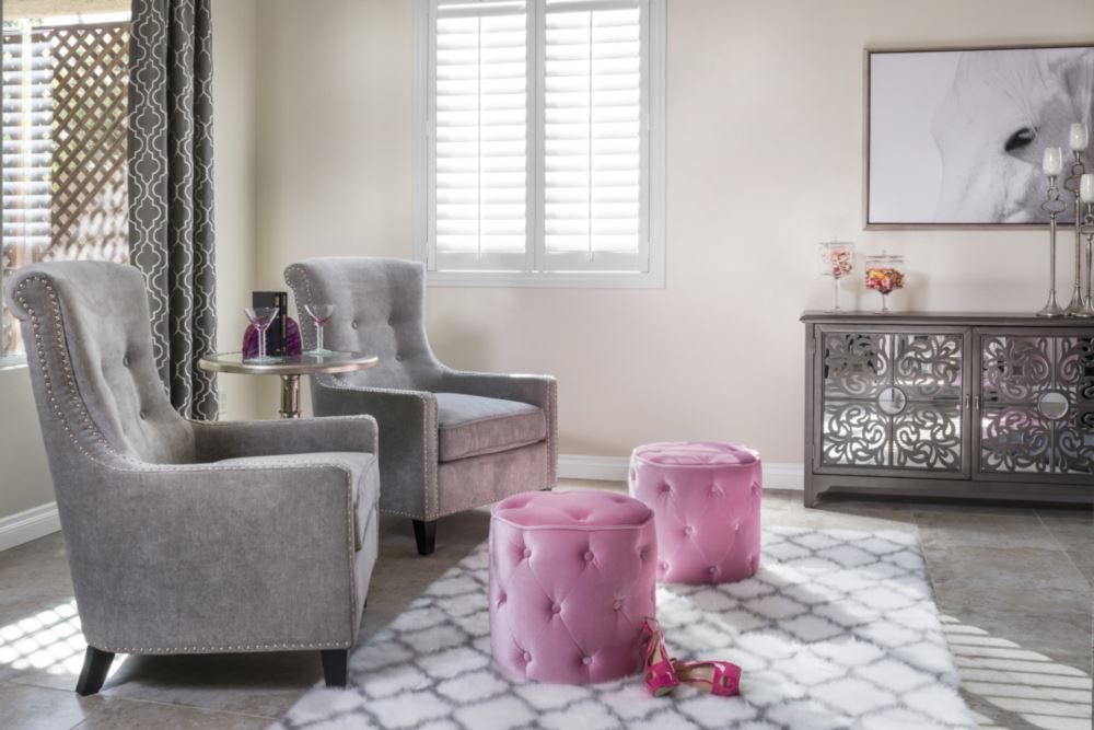 Riverside pink living room with shutters