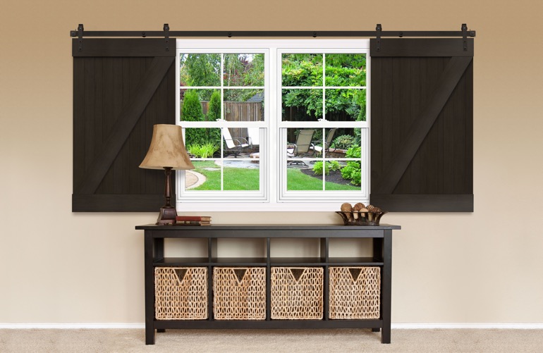 Sliding Barn Doors As A Window Treatment In Riverside Sliding barn doors covering a window