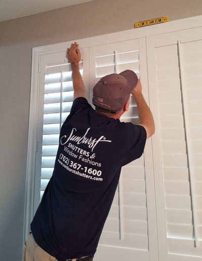 Shutter installation in Riverside bedroom.