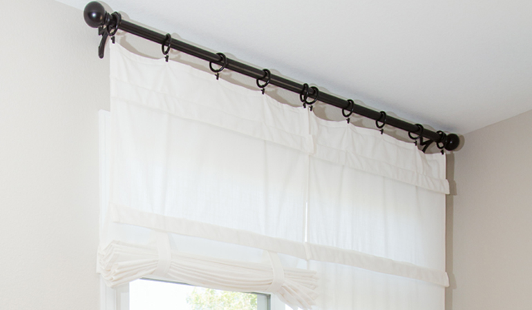 Tumble shades in Riverside give your doors privacy versatility and style. White tumble shade on double glass doors